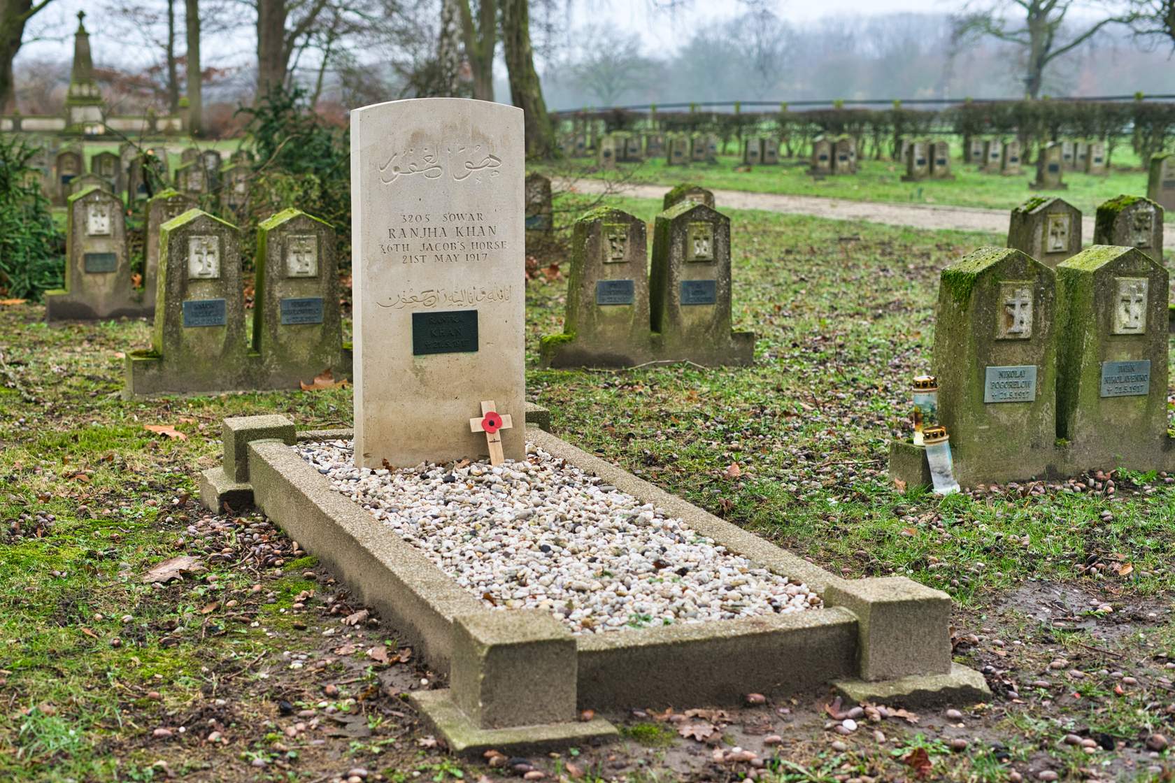 A war veteran cemetery that also includes a grave for a soldier's horse. Horses were still widely used in WWI.